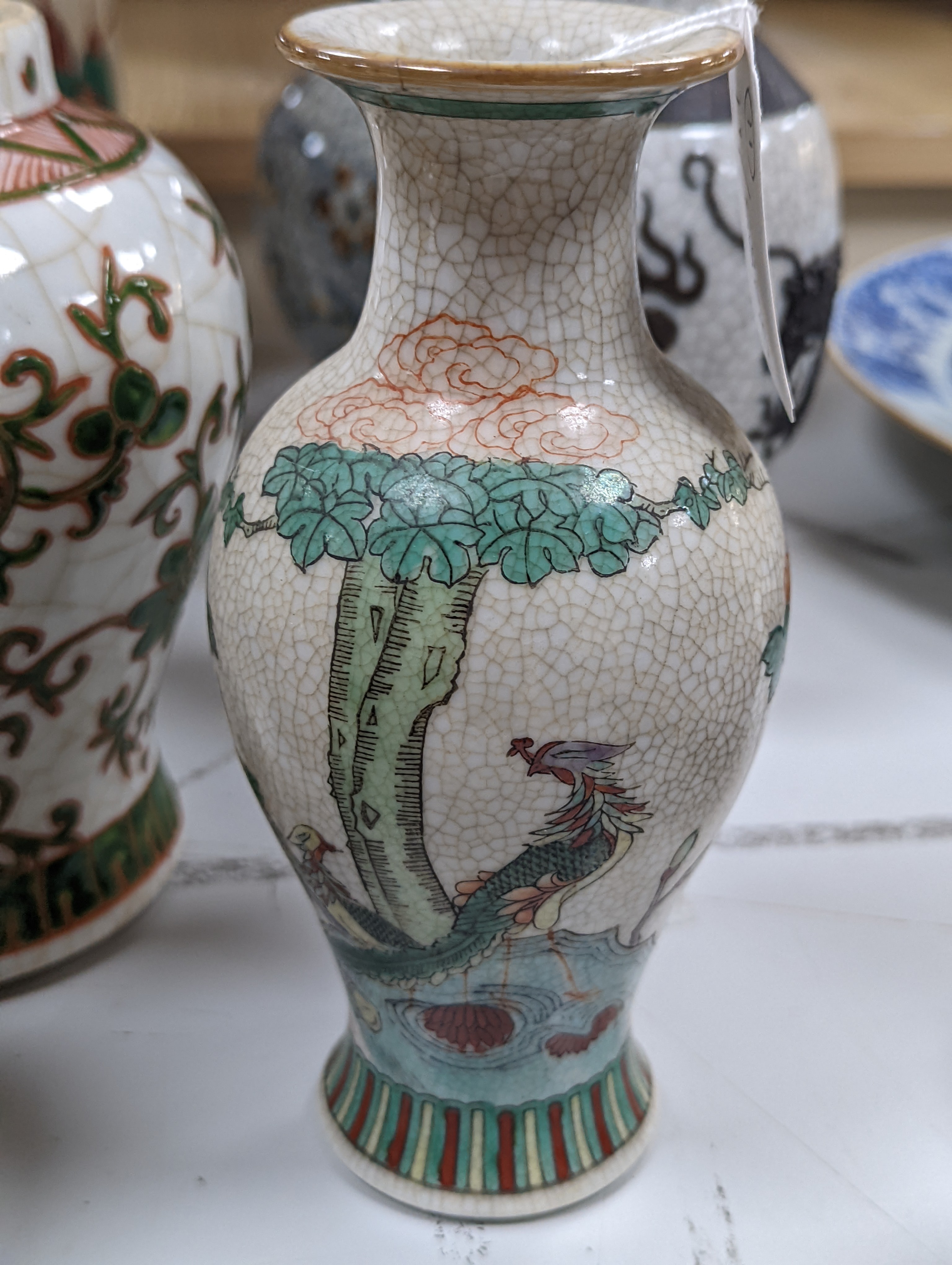 A group of 19th/20th century Chinese crackle glaze vases, tallest 30 cms high.